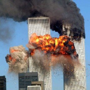 NEW YORK - SEPTEMBER 11, 2001: (FILE PHOTO) A fiery blasts rocks the south tower of the World Trade Center as the hijacked United Airlines Flight 175 from Boston crashes into the building September 11, 2001 in New York City. Almost two years after the September 11 attack on the World Trade Center, the New York Port Authority is releasing transcripts on August 28, 2003 of emergency calls made from inside the twin towers. (Photo by Spencer Platt/Getty Images)